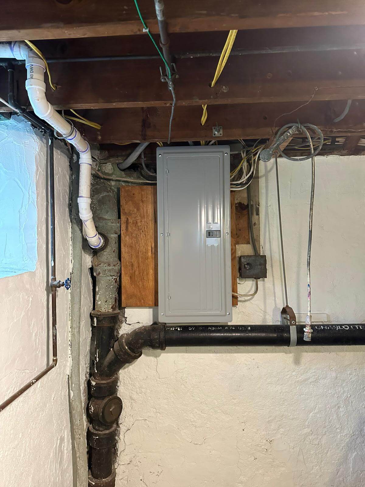 Licensed electrician performing detailed home electrical inspection to ensure code compliance, safety, and system reliability in residential property